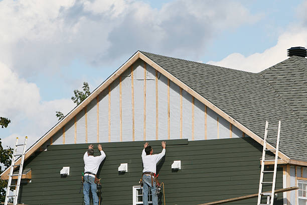 Professional Siding technician working in Erwin, NC